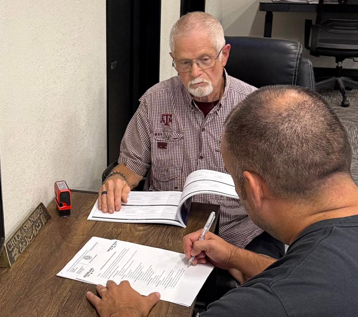 Brazos Valley Veteran Notary assisting with a document signing